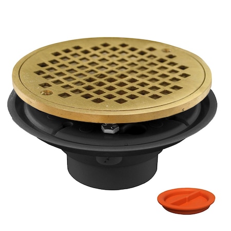 Jones Stephens 2inX3in PVC Shower Drain with 2in Brass Spud and 6in Round Polished Brass Strainer with Test Plug D50802TP